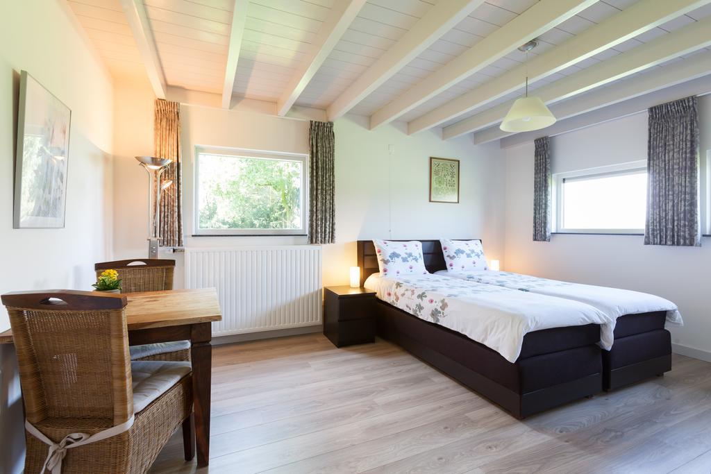 B&B Den Achterhof Uden Habitación foto